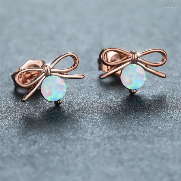 Pendientes de tuerca con lazo para mujer, aretes pequeños de ópalo blanco y azul, piedra redonda, Color rosa, dorado y plateado, infinito