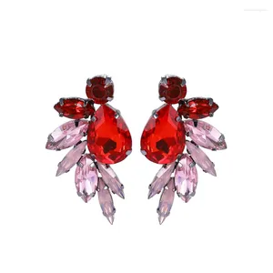 Pendientes de tuerca exagerados para mujer, dijes de Color negro dorado, cristal en forma de ala simétricos, joyería de moda para las orejas de piedra transparente