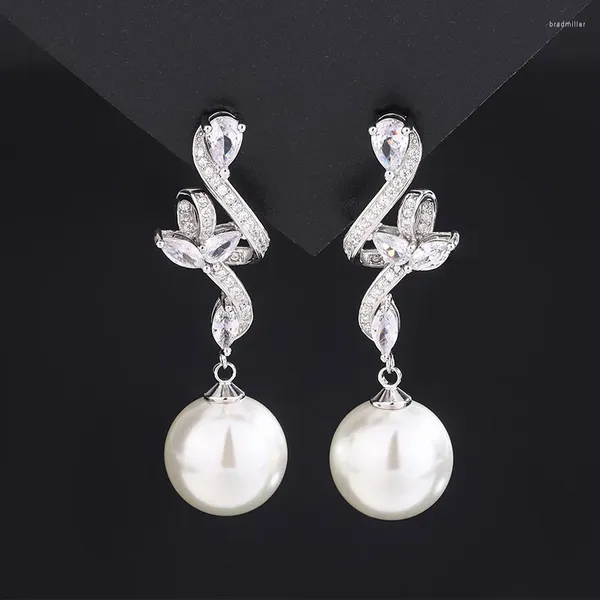 Pendientes de tuerca EYIKA, elegante diseño de onda retorcida, circonita pavimentada, gota grande de perla blanca y negra de 14mm para mujer, joyería para fiesta y boda, regalo