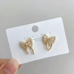 Boucles d'oreilles étalon Golden Color Metal Imitation Pearl Hollow Double Layer Bow pour femmes Party de mariage mignon Coup de bijoux coréen doux