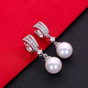 Pendientes de tuerca Preciosa circonita cúbica blanca, joyería de moda con perlas, Plata de Ley 925 HERE0050