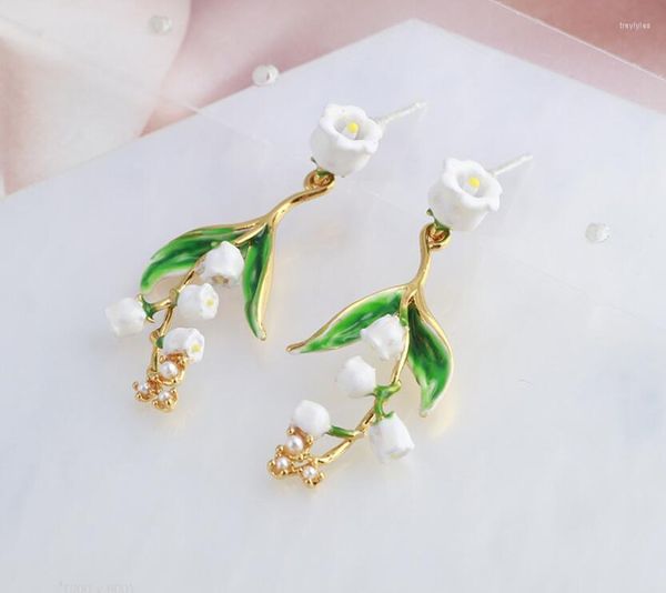 Boucles d'oreilles clous peintes à la main émail glaçure fleur de lys blanc frange bijoux pour femmes