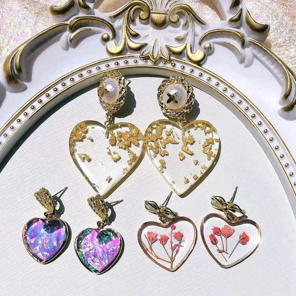 Pendientes de tuerca Japón y Corea del Sur pegamento de resina flor seca corazones pendiente de plata único Color flores dulce chica Joker elegante