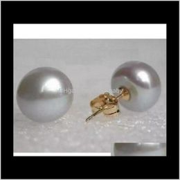 Orecchini a bottone Gioielli Drop Delivery 2021 Una coppia di 10 -11 mm Orecchini di perle grigie naturali del Mare del Sud Accessori in oro 14 carati Txqki