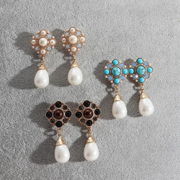 Boucles d'oreilles bijoux perle incrustation à la mode fleur gouttelettes d'eau évider personnalité exquise femme