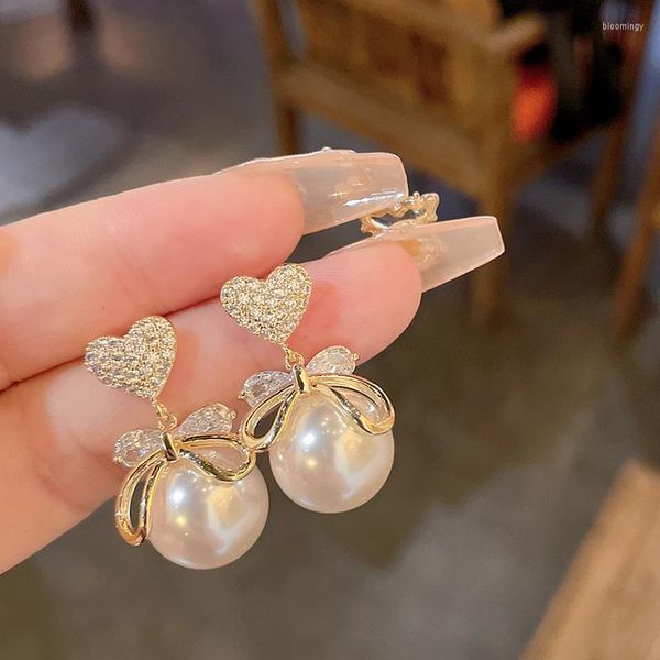 Boucles d'oreilles coréennes élégantes arc Imitation perle boucle d'oreille strass brillant pour les femmes mode bijoux mariée fête mariage amis cadeaux