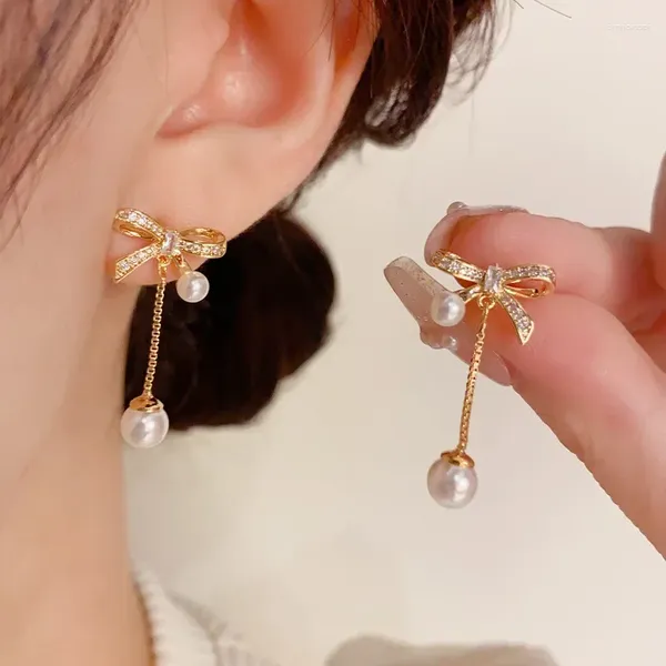 Pendientes de tuerca coreanos exquisitos, dulces y a la moda, borla de mariposa, perlas, agujas de plata 925, temperamento de alta calidad