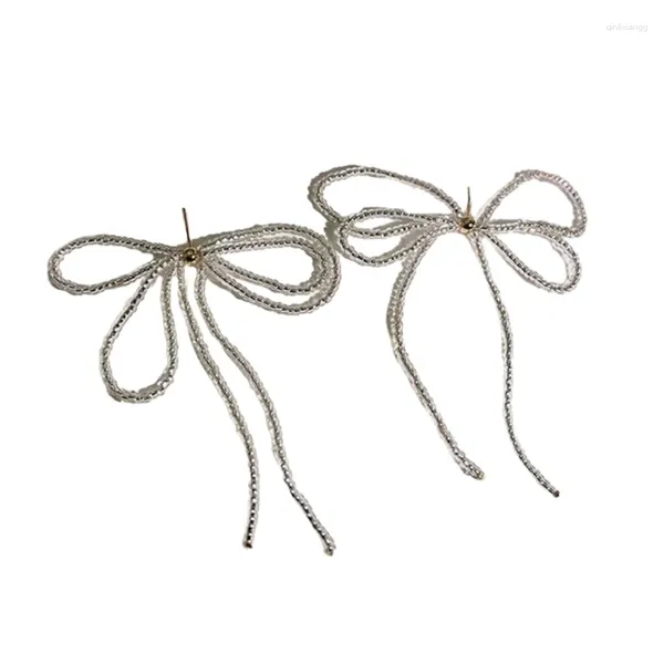 Boucles d'oreilles clairs luxury bowknot goutte de longs riches de graines de graines de graines poteaux d'oreille pour les femmes