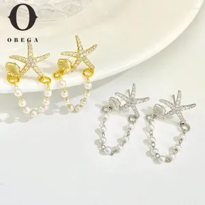 Pendientes de sementales Obega 2 PCS Cáscaras de estrella de mar IMitando Pearl Dangle Pendiendo para una mujer con joyería de playa de verano brillante y brillante