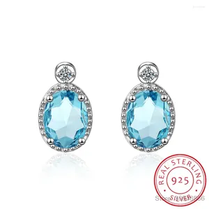 Boucles d'oreilles ovales 1.2ct véritable topaze bleu 925 argent sterling pour les femmes bijoux de pierres précieuses de la mode.