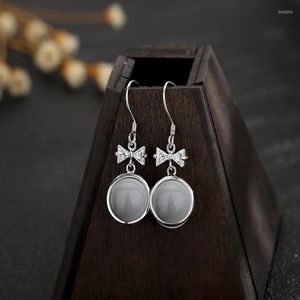 Boucles d'oreilles à tige S925 en argent sterling rond opale zircon femmes mode simple arc lumière luxe vente en gros. 1