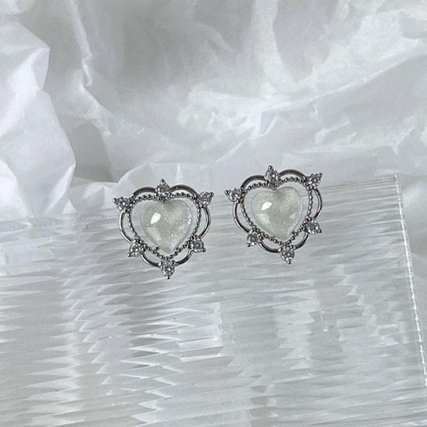 Pendientes de tuerca VSnow, pendientes de corazón huecos de diseño único para mujer, estilo Ins, diamantes de imitación, joyería blanca de Metal de Color plateado