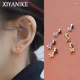 Pendientes XIYANIKE dulce flor Linda Anti-caída tornillo para Mujer chica moda oreja Piercing joyería Aretes De Mujer