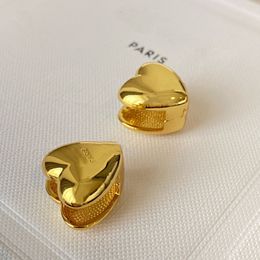 Stud Europa América Joyería de moda Suave 24 K chapado en oro Pendientes de corazón para mujer Famoso diseñador Marca de lujo Chica Regalo Trendy 230801