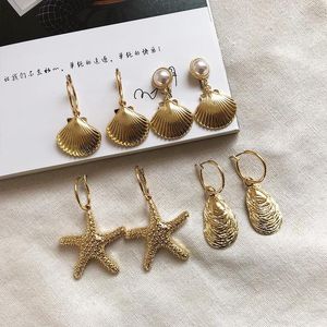 Stud Gaku Metal Style Ocean Wind Holiday Starfish Shell Pearl Boucles d'oreilles Vintage Ear Trendy Pendant1