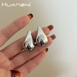 Stud Huanzhi grandes boucles d'oreilles goutte d'eau pour femmes filles métal lisse design simple à la mode gros bijoux cadeaux trajet 230922