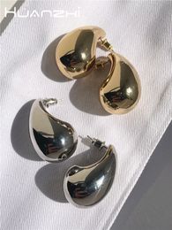 Stud HUANZHI goutte d'eau à moitié vide boucles d'oreilles pour femmes fille en laiton lisse métal personnalisé Simple charme bijoux à la mode 230620