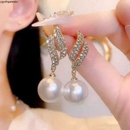 Étalon nouvelle tendance de mode Design élégant exquis léger luxe perlé boucles d'oreilles de mode féminine bijoux premium cadeau en gros stww