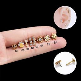 Stud Piece Titanium Insert Push Pin Lèvre Nail Oreille Os Clou Creux Fleur Ours Patte Forme Européen et Américain Titane Piercing Nail YQ231128