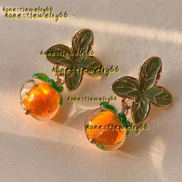 Boucles d'oreilles créatives kaki couleur Orange feuille de fleur pour femmes boucles d'oreilles bijoux peinture verre émaillé à l'huile tendance bijoux en gros 2024