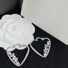 Pendientes de cristal delicados tipo corazón de plata de alta calidad con pasador, pendientes sencillos con lazo de oreja de diamante a la moda de diseñador para mujer