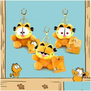 Animaux en peluche en peluche Cartoon mignon 4 pouces jaune Cat P jouet poupée Keychain Grab Hine Sac Pendentif Drop Livraison Toys Cadeaux otlfa