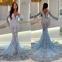 Impresionantes vestidos de noche de sirena de cristal azul ilusión V cuello mangas