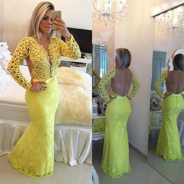 Impresionante vestidos de noche de encaje de manga larga perlas.