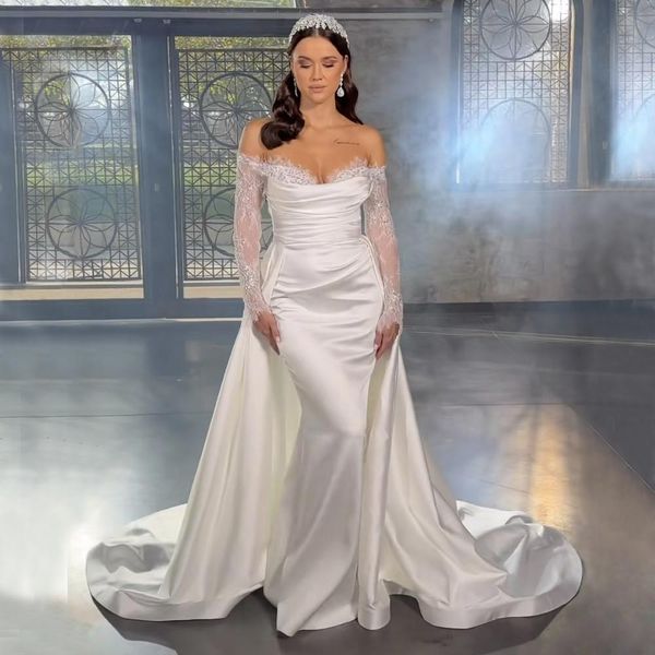 Superbes robes de mariée sirène surjupe avec train détachable robes de mariée en dentelle manches longues sur l'épaule décolleté satin robe de novia