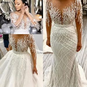 Impresionantes perlas rebordear vestidos de novia nigerianos africanos con tren desmontable Mangas largas Vestidos de novia de sirena de talla grande Vestidos de novia con cuello redondo sexy CL2810