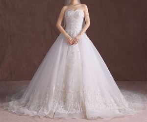 Superbes robes de mariée robe de bal tribunal train robe de mariée perles majeures paillettes lacets dos tulle avec dentelle appliques robes de mariée ivoire