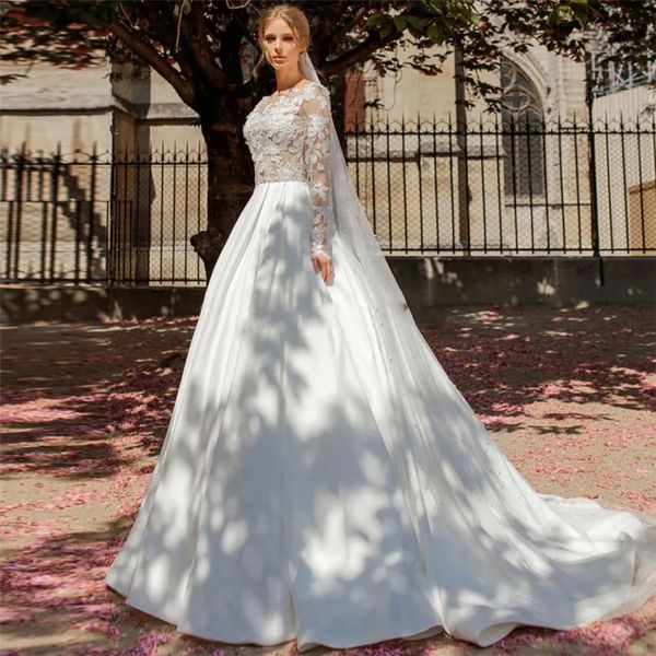 Stunningbride 2024 Appliques de dentelle à manches longues Robes de mariée A-Line Princesse Illusion Sexy Backless Bridal Bridal Custom Online Forme
