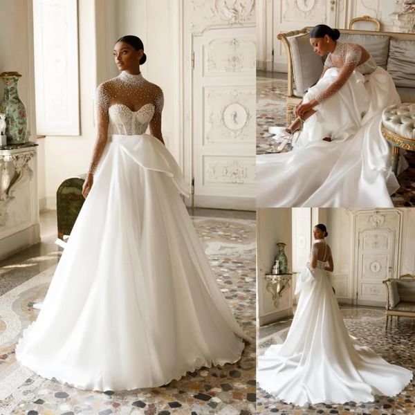 Stunningbride 2024 Moda blanca Perlas elegantes Vestidos de novia de una línea Cuello alto Manga larga Satén Vestido de novia Pajarita Cinturón Corte Tren Vestido de novia