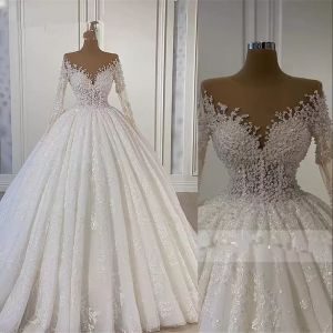 Superbe robe de mariée de luxe scintillante avec des appliques en dentelle, col de bijoux, manches longues, illusion de perles de cristal, longueur au sol, grande taille