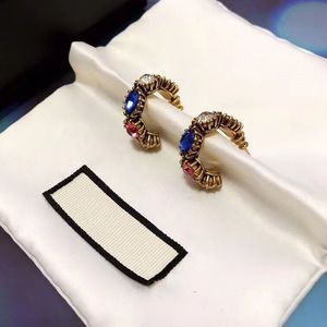 Boucle d'oreille personnalisée en diamant de couleur, matériau en laiton