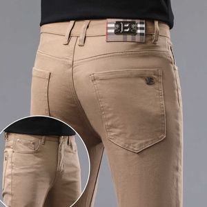 Style Jeans kaki européens pour le printemps et l'été Mens Slim Fit Small Straight Tube Casual Elastic Panton Panton Long