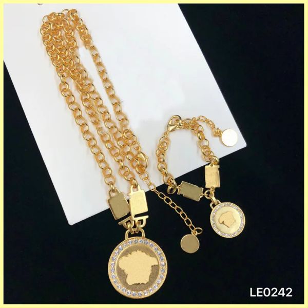 Bracelet de créateur élégant et collier pour hommes femmes bijoux de luxe ensemble créateurs de mode bracelet tête d'or collier chaîne lien mariage
