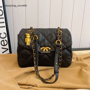 Sacs à main élégants des meilleurs designers Sac pour femme simple et élégant Niche noire Haut de gamme Sentiment de faim Capacité Grille Épaule Pu Bandoulière