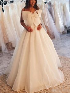 Élégant ivoire Simple une ligne robes longueur de plancher Organza devant grand arc plage jardin mariage robe de mariée grande taille