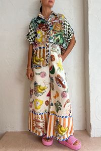 Elegante dama de fruta estampada con estampado de 2 piezas Camisa de manga corta y trajes de pantalón de piernas anchas 2024 Trajes de vocación de playa suelta de verano de verano