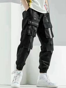 Pantalon de cargaison masculin élégant avec plusieurs poches à crampons réglables Ajustement régulier de tissu non-unftch Machine lavable 240422
