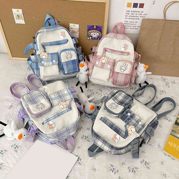 Élégant Nylon Pendentif Filles École Sacs À Dos Femmes Bande Dessinée Plaid Impression Shopping Sac À Dos Petit Voyage Sac À Dos Y1105