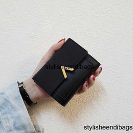 StylisHEdibags Wallets Designer Nieuwe V Koreaanse portemonnee vrouwelijke korte paragraaf Wild Student Wallet Lady Card Bag Three Mind Coin Portemonnee Trend gratis verzending