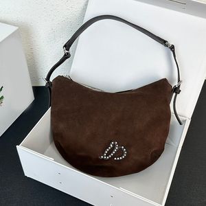 Bolso Hobo de gamuza Bolsos de hombro de diseñador metálicos Bolso para axila Bolso vintage para mujer Bolso de cuero genuino Bolso de mano Cueros interiores Hardware plateado Bolsos vagabundos de lujo Bolsa