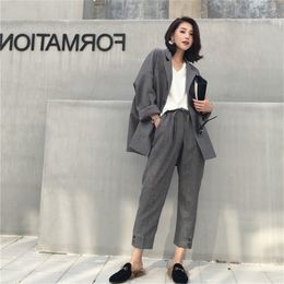 Traje femenino 2019 primavera y otoño nuevo profesional OL traje de manga larga pantalones temperamento de dos piezas ropa de mujer suelta T200818