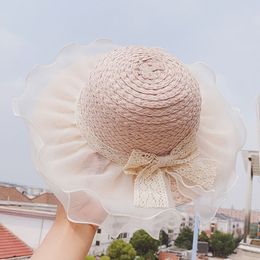 Été bébé filles casquettes de voyage enfants mignons dentelle bowknot écran solaire chapeau de paille enfants princesse Sun Shade beaux chapeaux de plage S1044