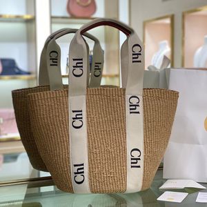 Bolsos de playa de verano Bolsos de diseñador de moda Bolso para mujer Bolso de hombro tejido con alfabeto Bolsa de compras Bolsa de playa de lino Bolsa de gran capacidad