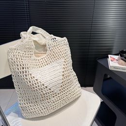 Bolso de viaje de playa de verano, bolso de paja de rafia para mujer, bolso de compras tejido de moda parisina de diseñador lujoso con diseño hueco