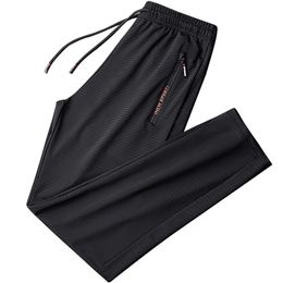 Verano transpirable malla negro pantalones de chándal hombres joggers ropa deportiva pantalones holgados masculinos pantalones de pista casual más tamaño 7xl 8xl 9xl 211013