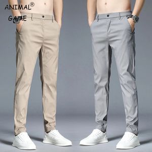 Pantalons décontractés d'été Men Thin slim ajustement élastique Business Cotton Business Classic Classian Colant coréen Male KaKi Gris 28-38 240423